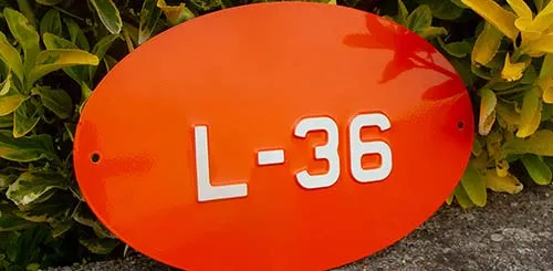 Available in a huge range of colours. Oval Embossed House Number