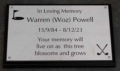 Stainless steel plaque on black backing board. Stainless Steel Plaque