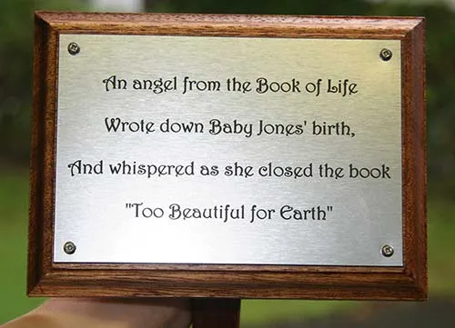 Silver engraved plaque on a backing board. Silver Acrylic Laminate Memorial Plaque