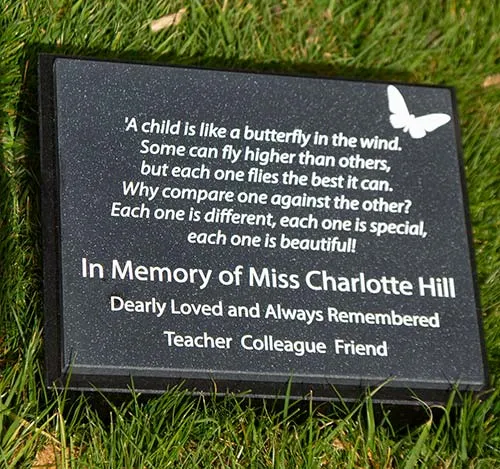 This plaque has been engraved in corian which is very low maintenance. Childs Engraved Memorial Plaque