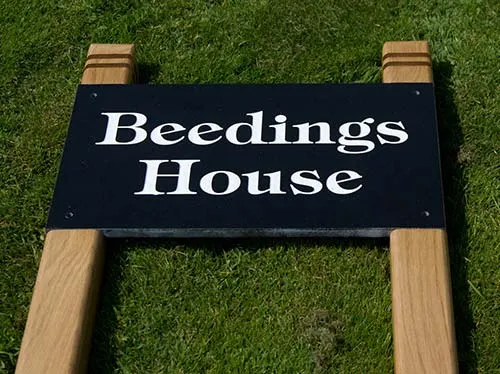 For large stone signs use 90mm x 90mm posts Granite Sign inset into Posts