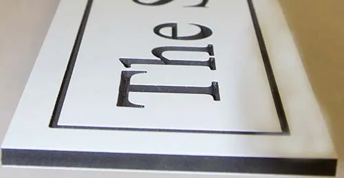 This engraved PVC can be cut to any shape. PVC Directional Sign