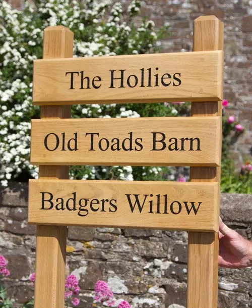 Our carpenters can create wooden signage to order. Estate Sign - Ladder Sign