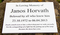 White corian memorial plaque. White corian memorial plaque.