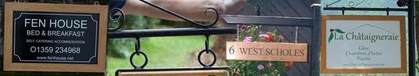 Hanging Signs with a Wooden Frame