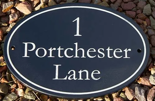 This slate name plate was oiled for a darker finish. Oval Slate Name Plate