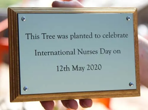 This engraved plaque was attached to an oak backing board. Engraved Acrylic Plaque