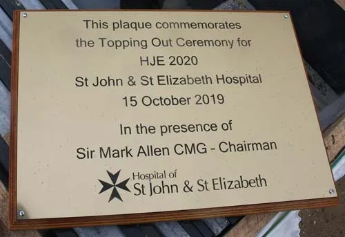 Engraved brass plaque on backing board. Engraved Brass Plaque