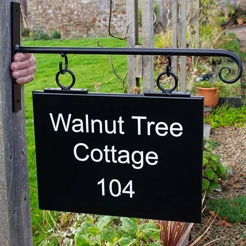This wrought iron sign bracket has been painted black. Wrought Iron Bracket