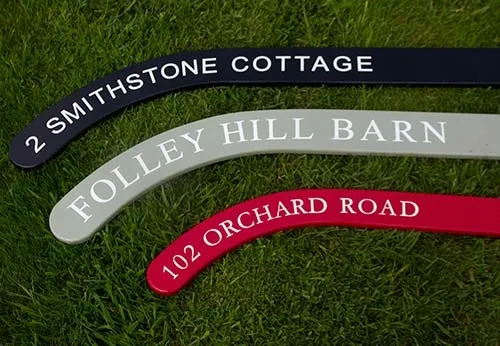 Painted Tricoya Hockey Stick Sign.