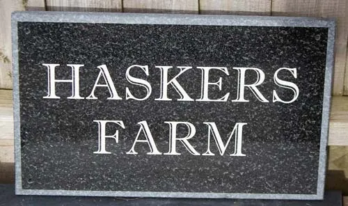 Dark grey granite sign with sand-blasted border. Dark Grey Granite Sign