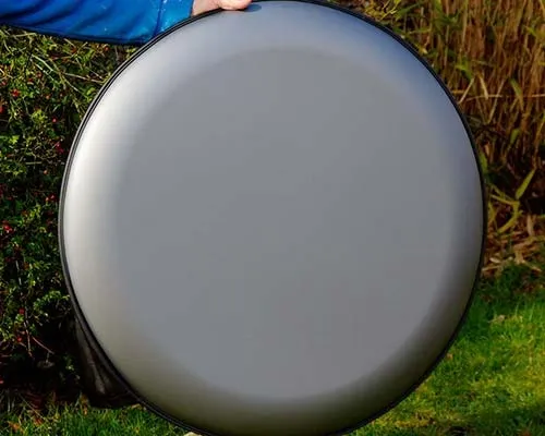 This hard wheel cover was wrapped before the skirt was sewn on. Silver Grey Hatd Wheel Cover