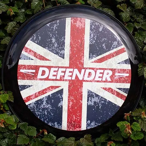 This is a full colour wheel cover with the print on the flat centre disk. Union Jack Defender Wheel Cover