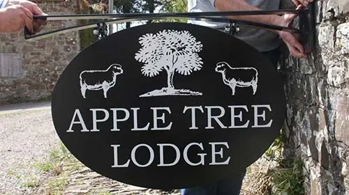 Modern sign bracket with oval sign panel. Hanging Bracket - Oval Sign