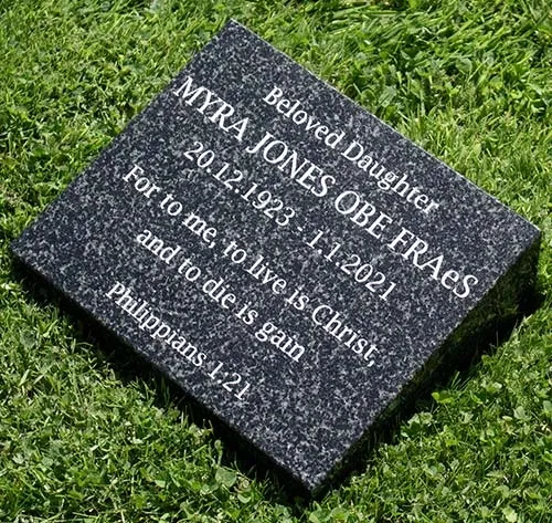 White text on dark grey granite wedge. Granite Memorial Wedge