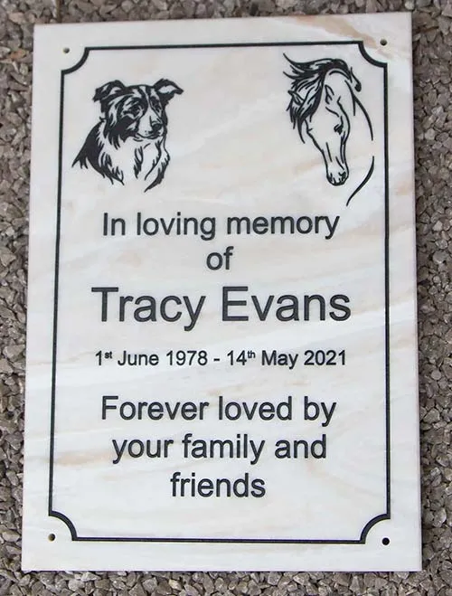 This memorial was engraved in a corian which looks like marble. Marble Corian Plaque