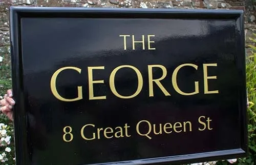 Rectangular fibreglass sign with haped moulding. Fibreglass Business Sign