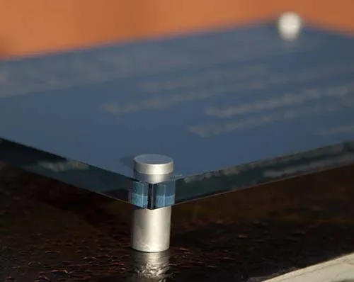 Close up showing stand away fittings. Painted and Etched Information Plaque