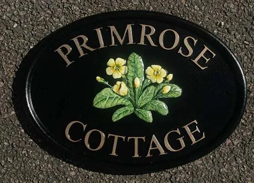 A number of standard motifs are available. Cast Oval House Sign With Motif