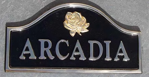 Cast brass is a very traditional material for house name plates. Cast Brass House Name Plates